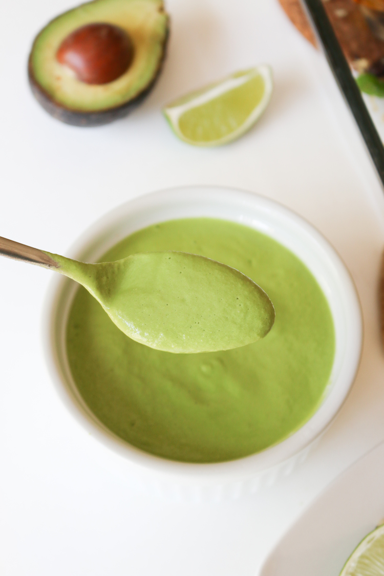 Quinoa Stuffed Sweet Potato with Cilantro Lime Sauce | www.LiveSimplyNatural.com